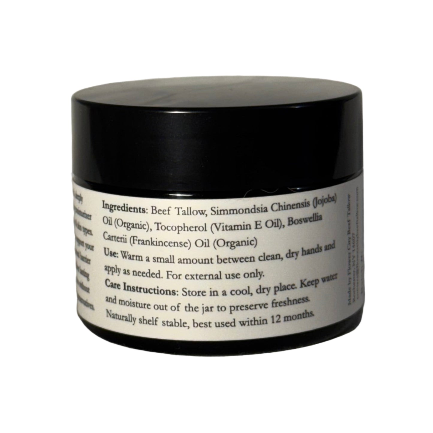 Beef Tallow Cosmetic jar with label on a textured white surface