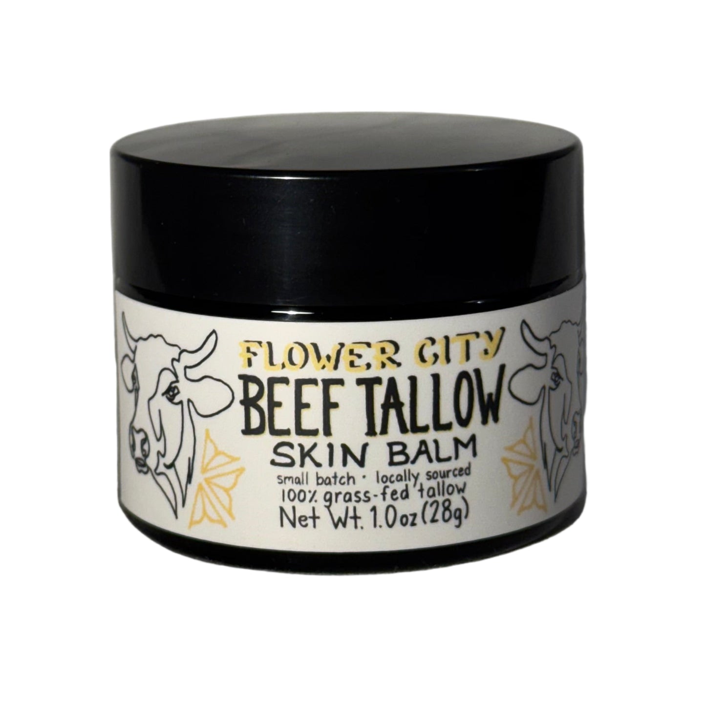 Beef tallow skin balm container on a white fabric background